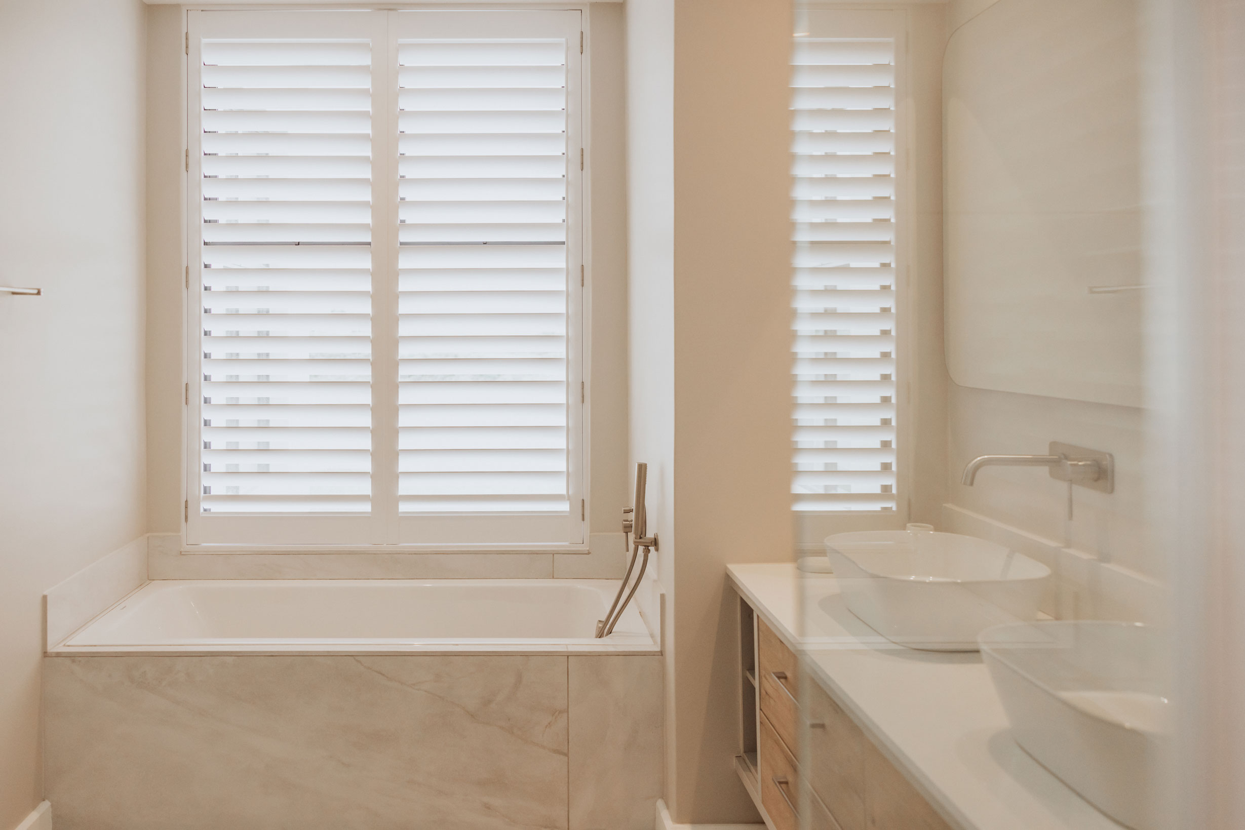 White shutters in a bathroom