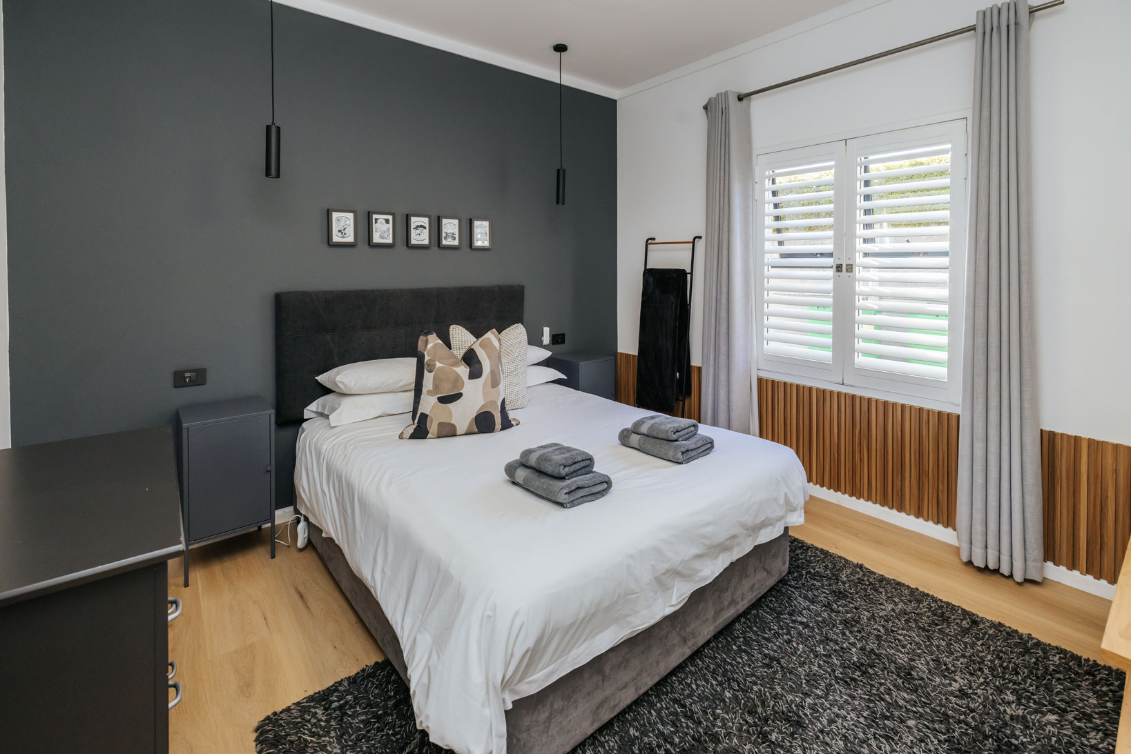 White shutters in a bedroom