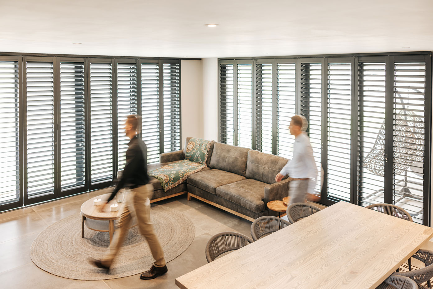 Charcoal shutters in a living room